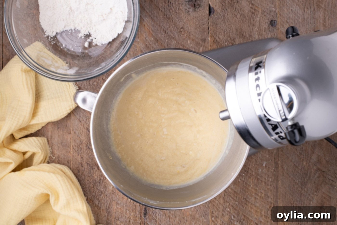 lemon cake batter in a mixer bowl