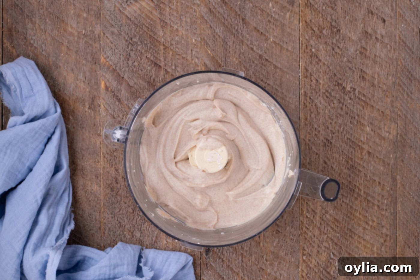 cinnamon, powdered sugar, and ricotta mixture being blended in a food processor