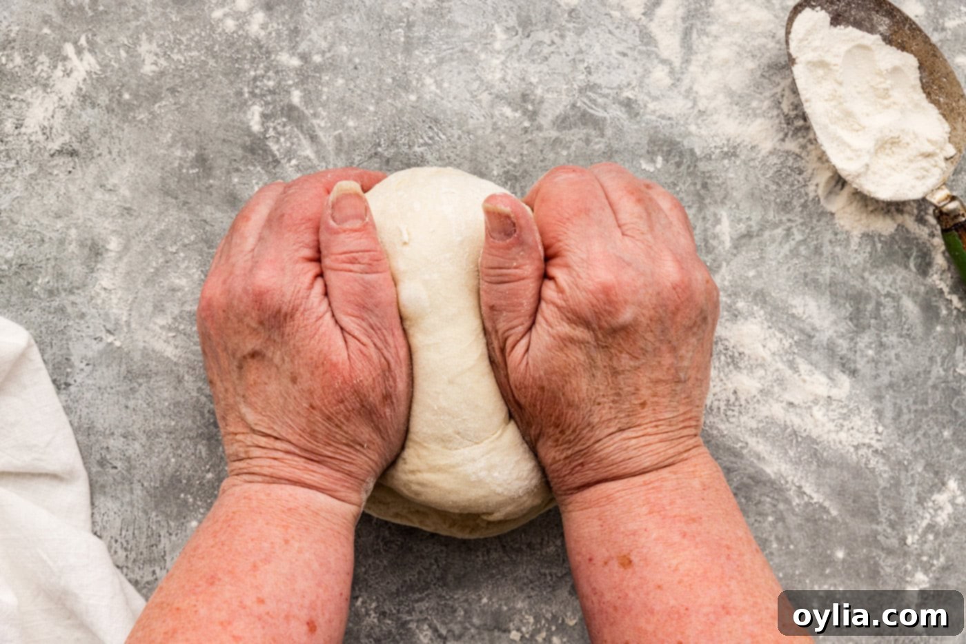 kneading dough with hands