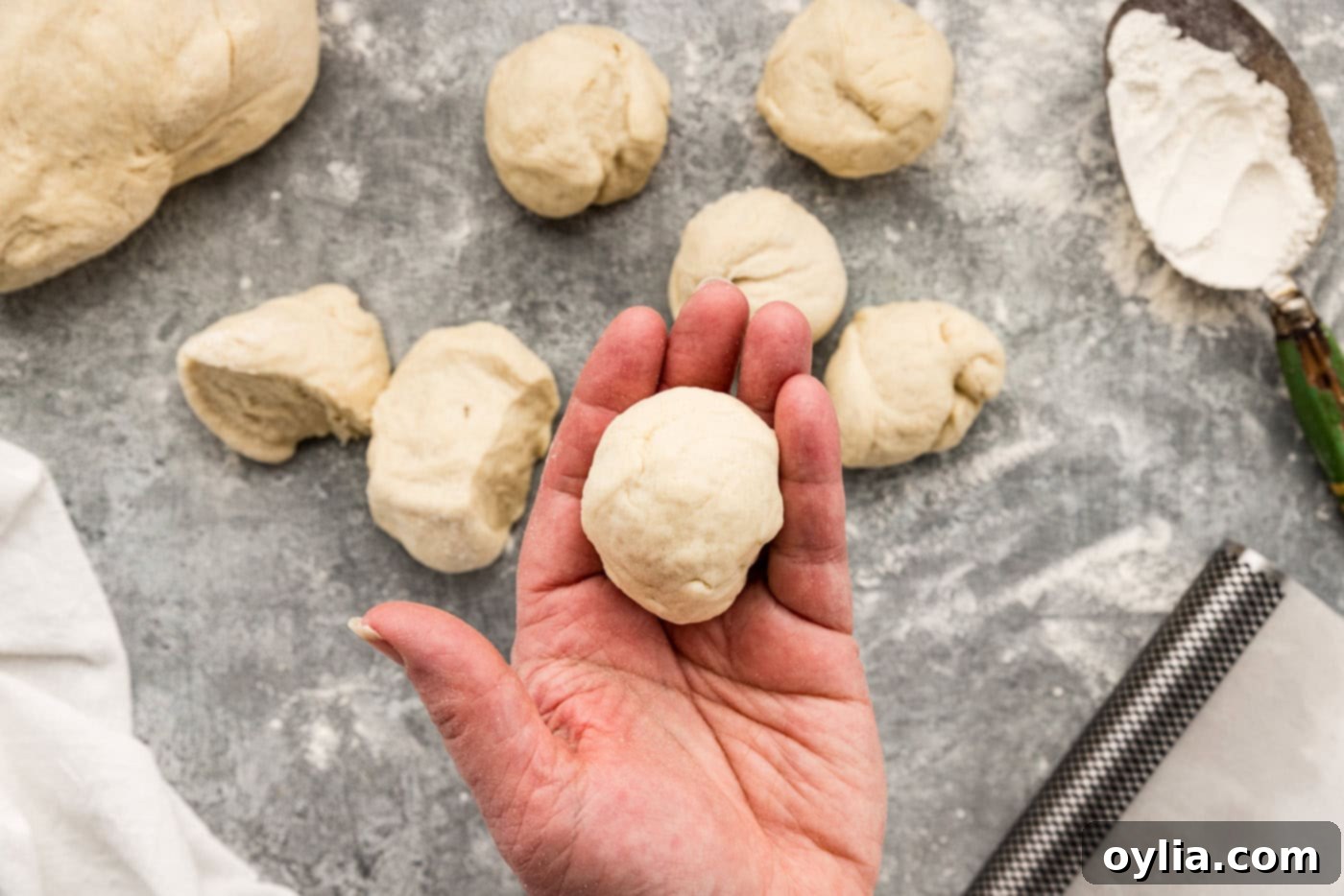 dough ball in a hand