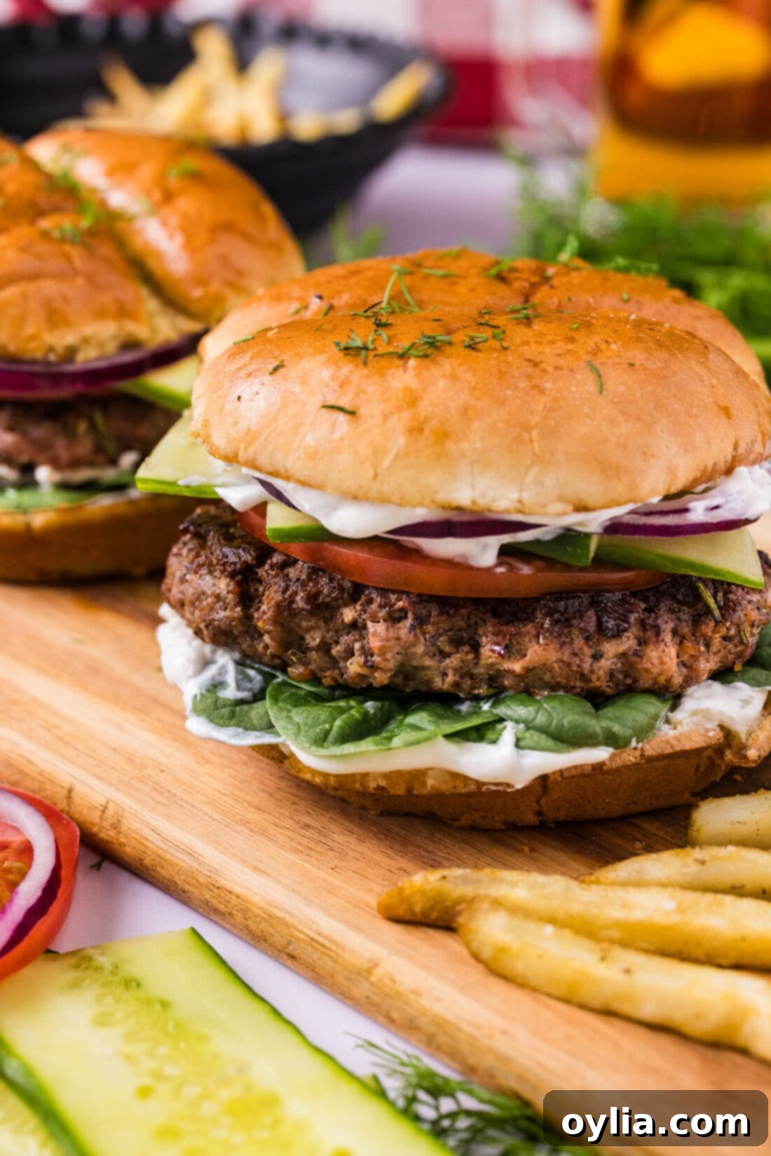 Gourmet Lamb Burgers 8 Close up photo of a Lamb Burger on a wooden board