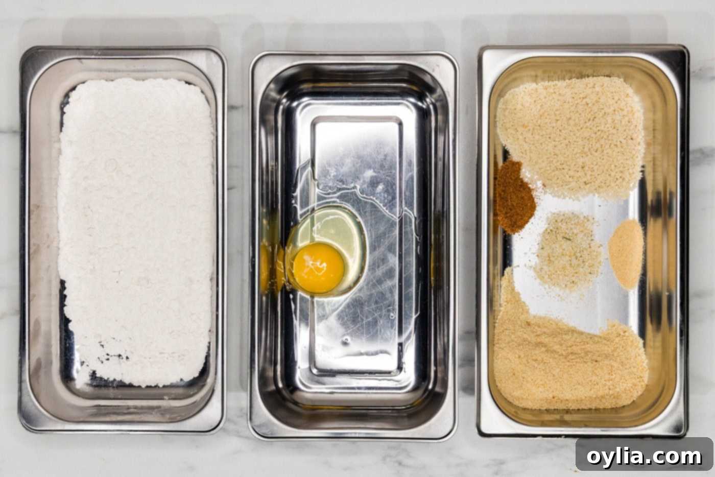 breading trays with flour mixture, egg, and panko mixture
