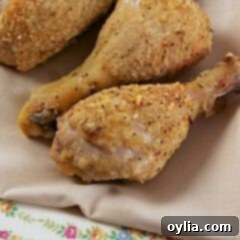 Crispy Oven Baked Drumsticks 9 A close up photo of oven fried chicken drumsticks.