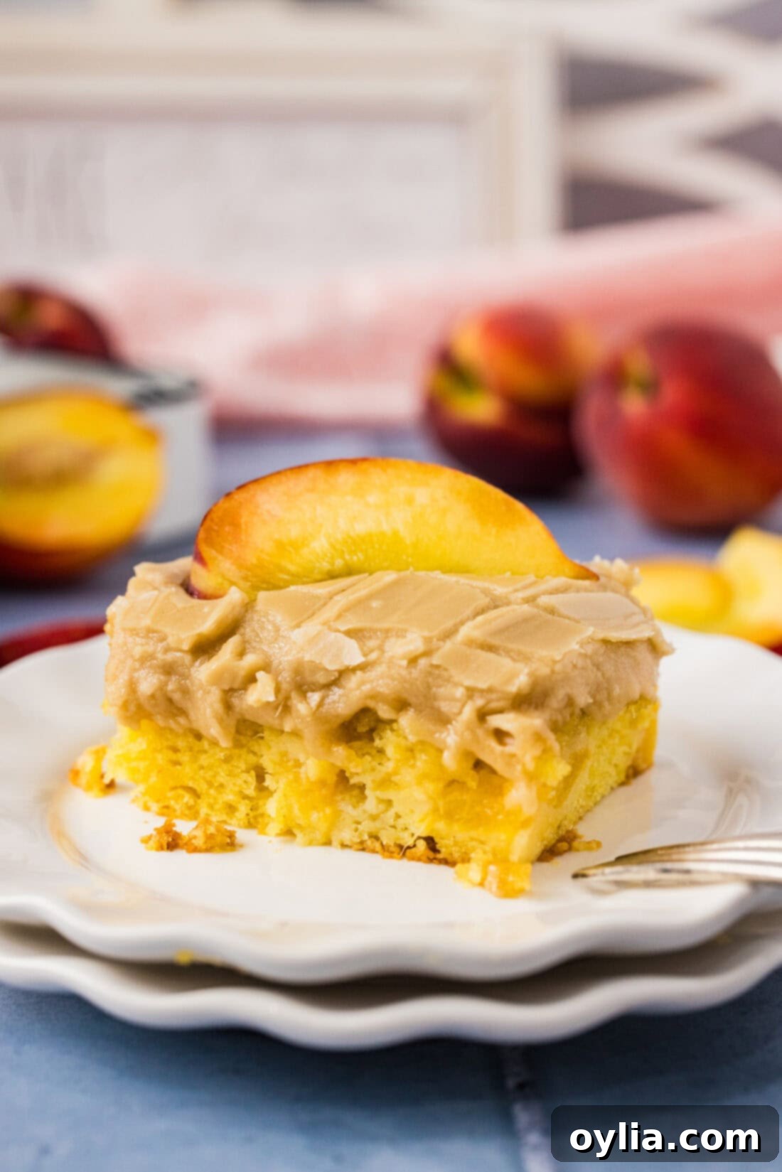 Slice of Brown Sugar Peach Cake on a plate