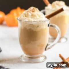 pumpkin spice latte in a clear mug
