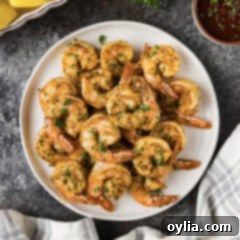 Plate of delicious Broiled Shrimp, perfectly cooked and ready to eat