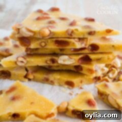 Irresistible Homemade Peanut Brittle 2 Stack of freshly made homemade peanut brittle pieces