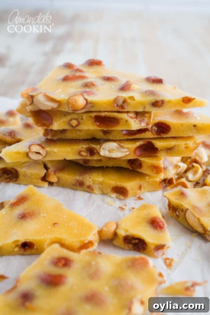 Perfectly cut pieces of homemade peanut brittle arranged on a plate