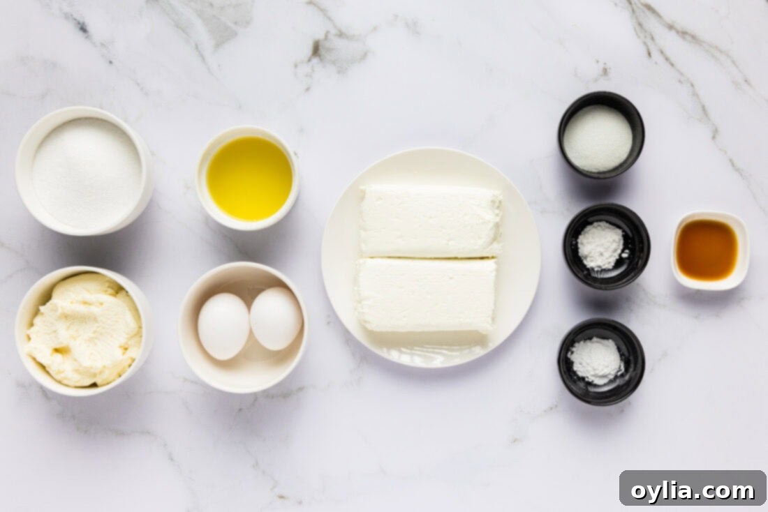 A selection of ingredients for Keto Lime Cheesecake Bites on a wooden board.