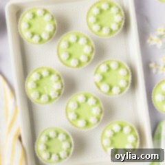 Close up photo of Keto Lime Cheesecake Bites on a baking sheet, ready to be enjoyed.