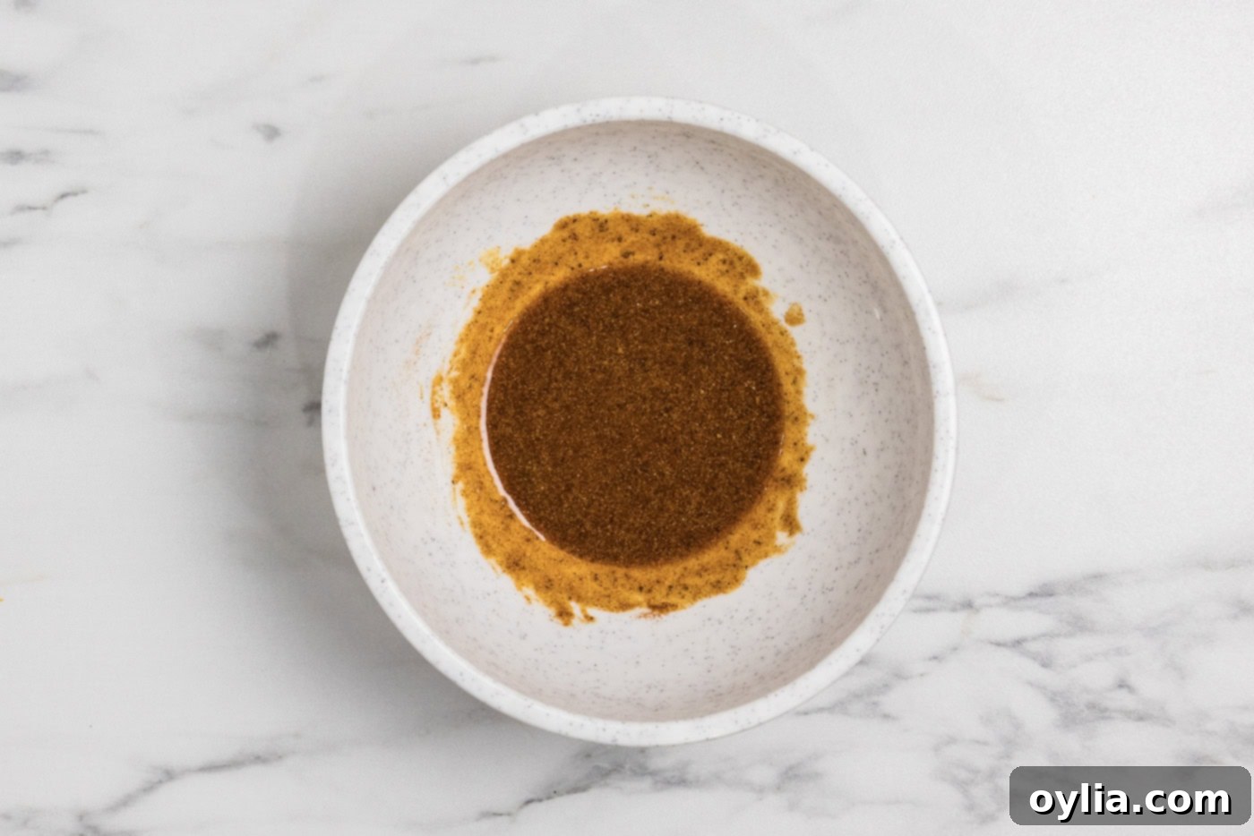 bowl with seasonings and olive oil