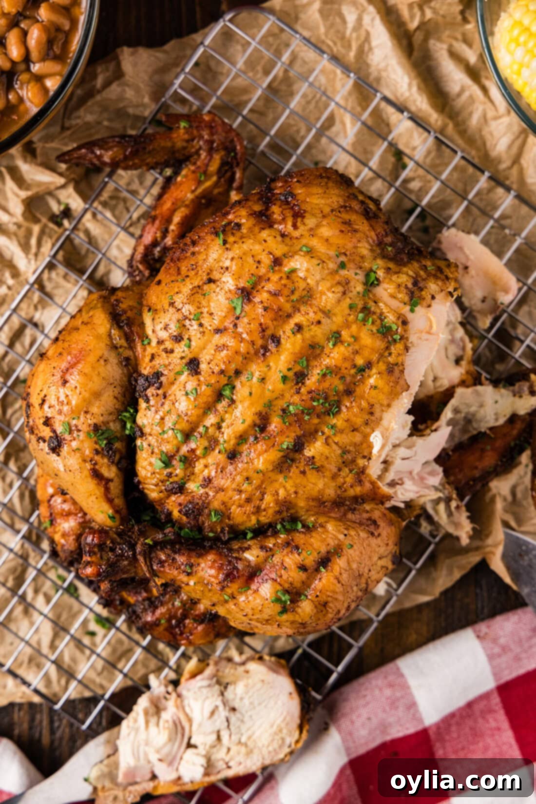 Smoked Chicken cut apart on a wire rack