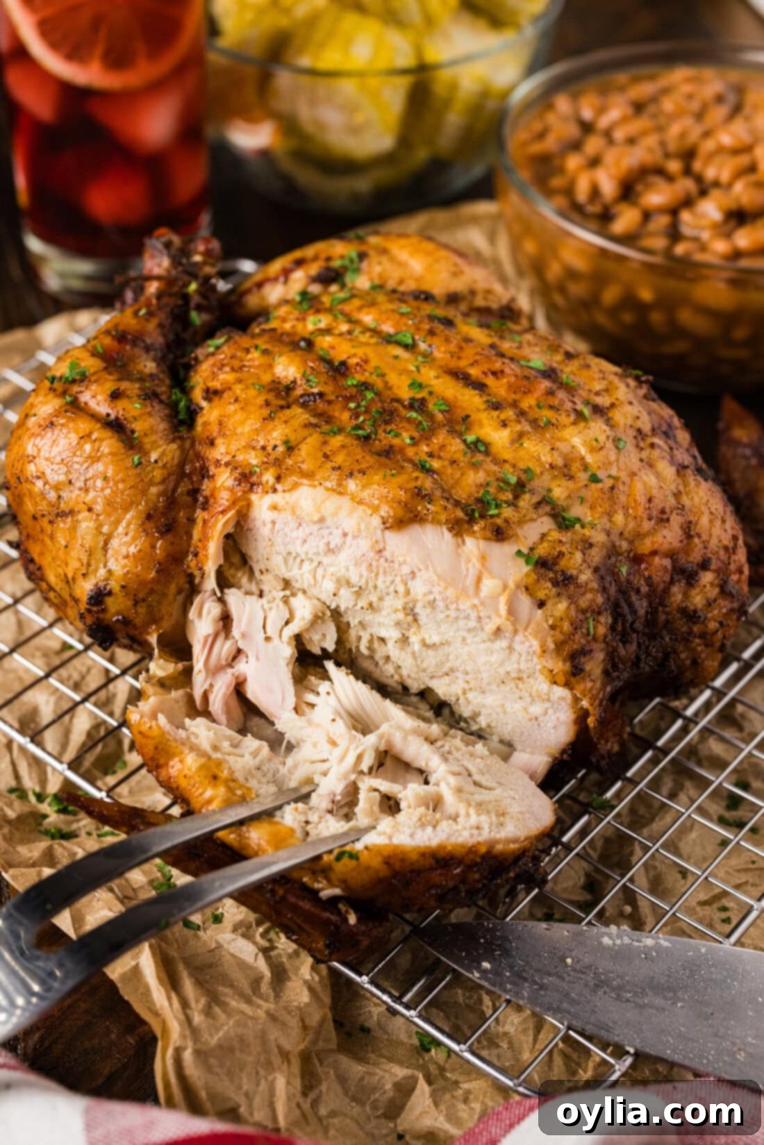 Close up photo a Smoked Chicken with a piece cut off