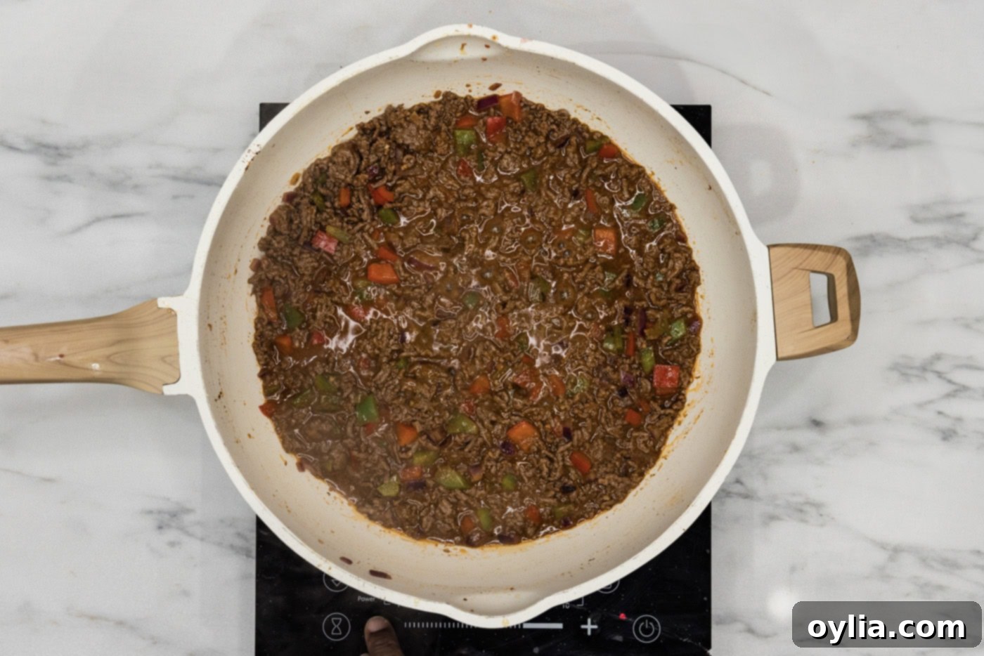 Philly cheesesteak sloppy joe mixture in a skillet