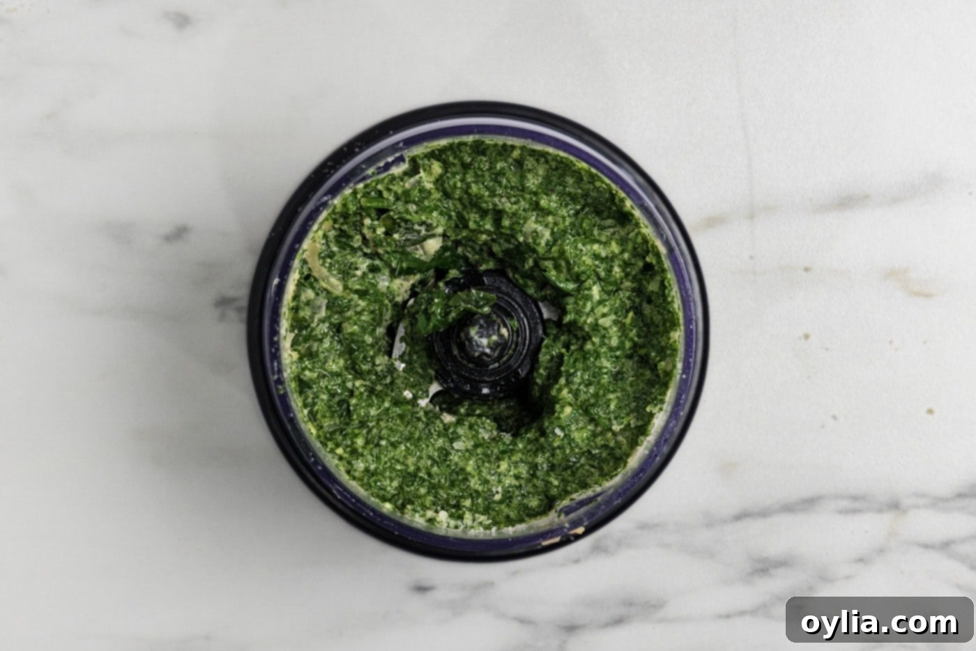 blitzed parmesan and spinach sauce in a food chopper