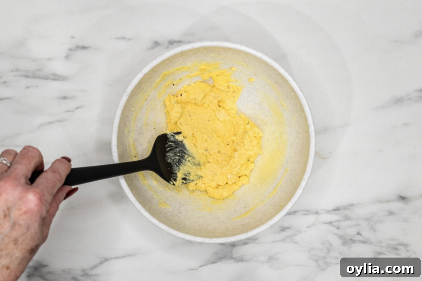 deviled eggs filling mixed together in a bowl