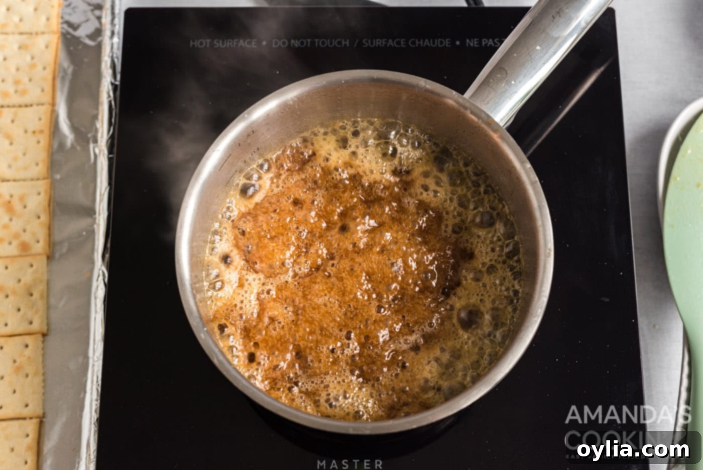 homemade caramel bubbling in a saucepan