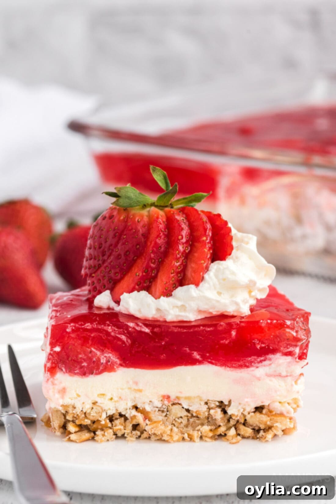 slice of strawberry jello pretzel salad
