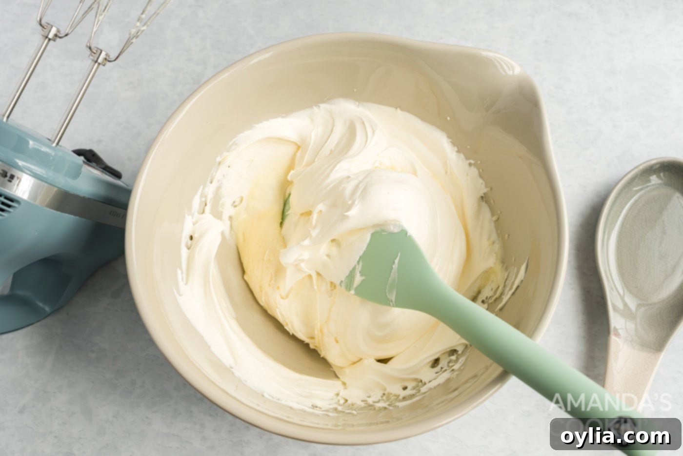 folding in whipped topping to cream cheese mixture
