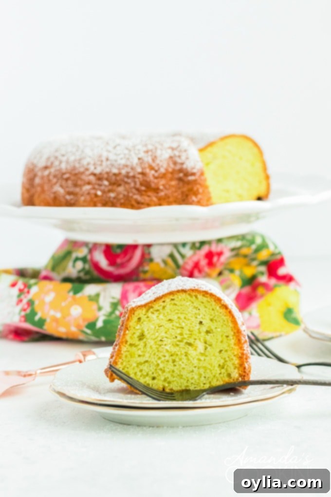 slice of pistachio cake on plate