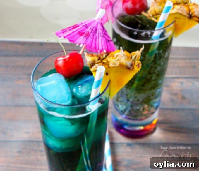 Close-up of a Blue Mermaid Cocktail showing the vibrant blue color of Blue Curaçao mixed with cream soda, garnished and ready.