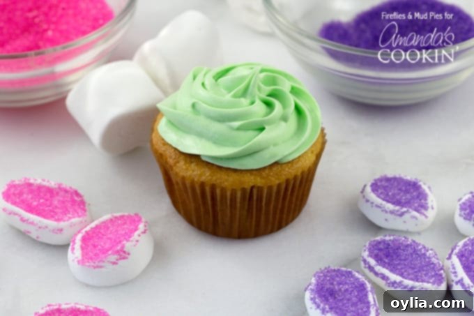 A cupcake with green frosting.