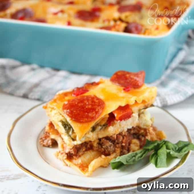A close up of freshly baked pizza lasagna on a elegant white and gold plate, ready to be enjoyed.