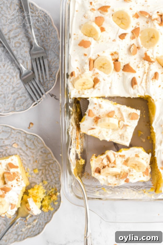 overhead view of sliced banana pudding poke cake