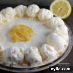 A plate of food with a banana on a table, with Pie