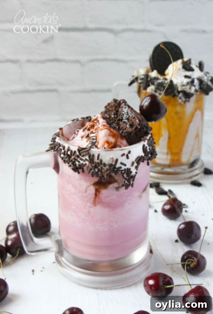 A photo of a cherry fudge chunk freakshake and a double caramel cookie crunch freakshake in the background.