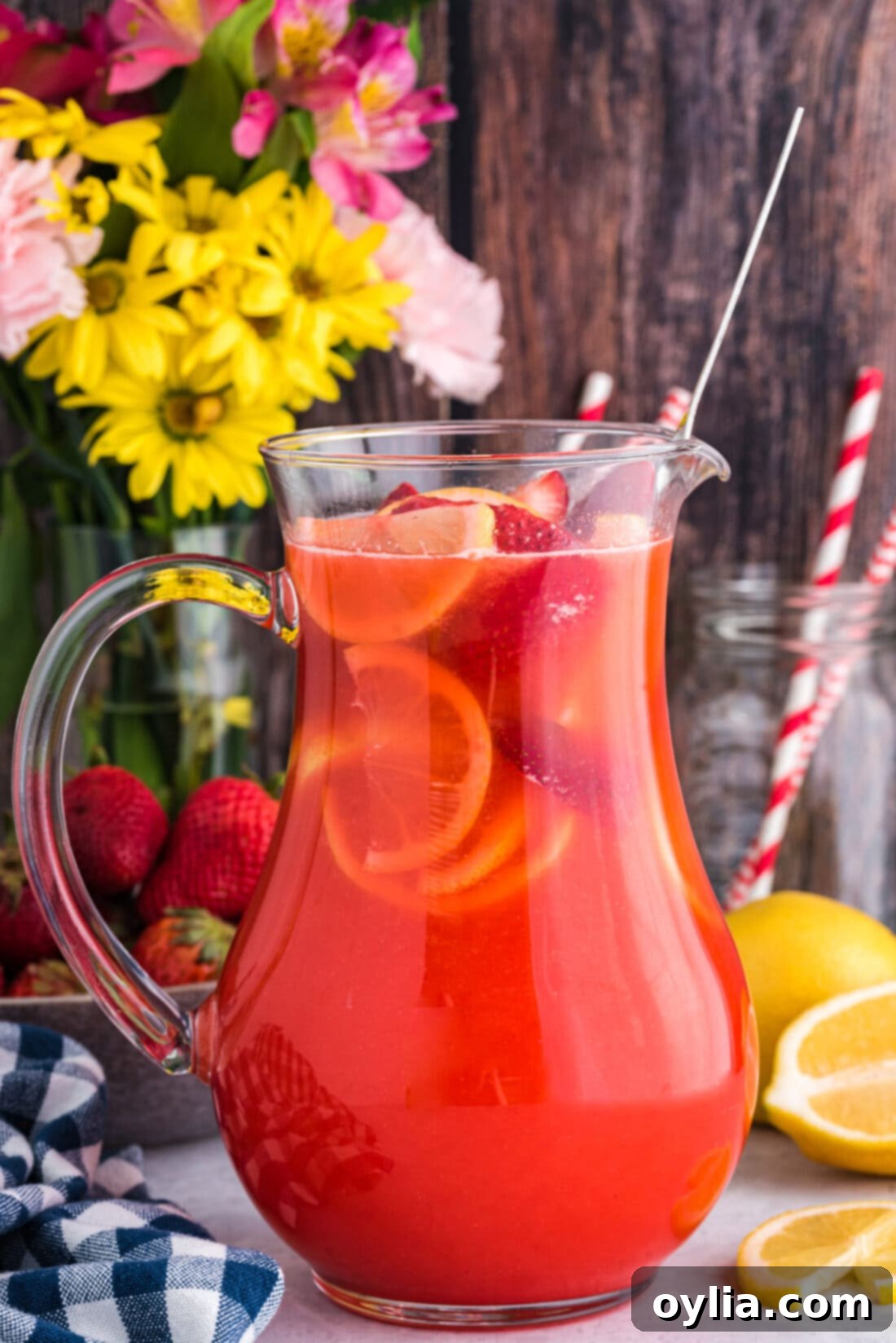 Easy Strawberry Lemonade in a pitcher, ready for serving