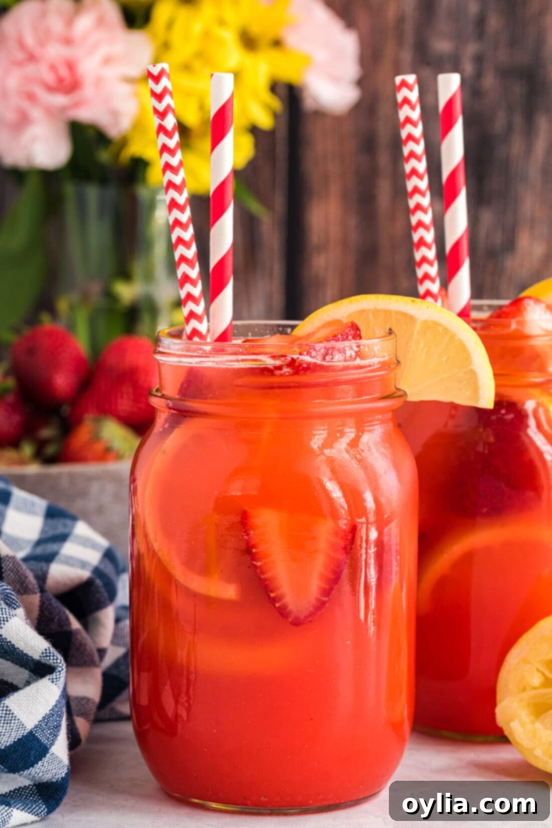 Easy Strawberry Lemonade in a mason jar with a straw