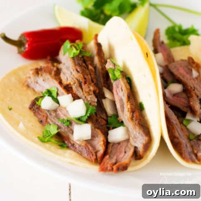 Authentic Carne Asada steak served in a corn tortilla