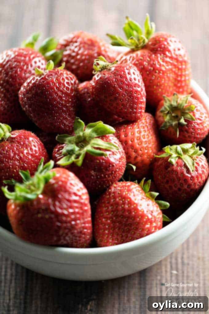 A photo of a bowl of strawberries.