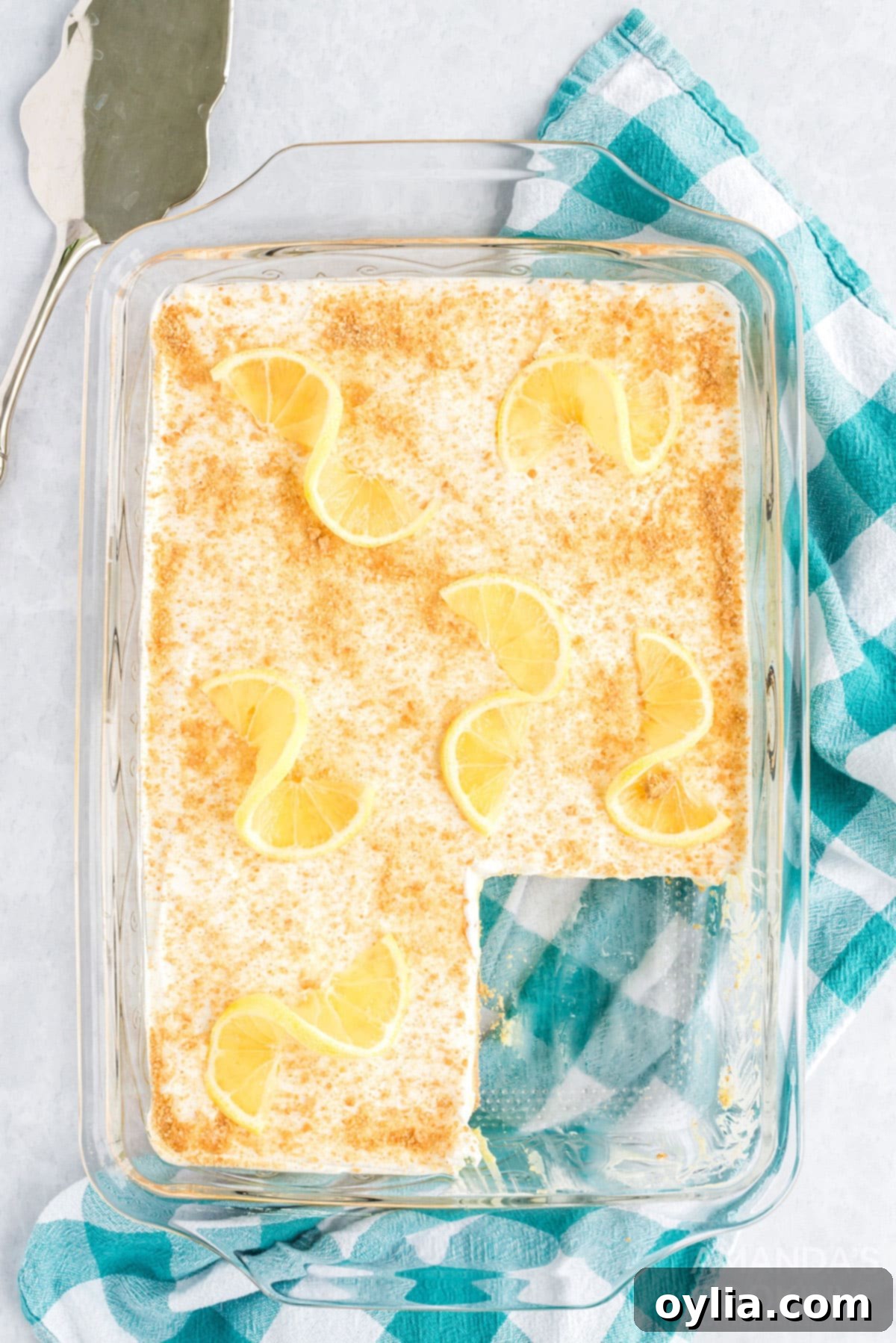 overhead view of dessert in pan garnished with lemons