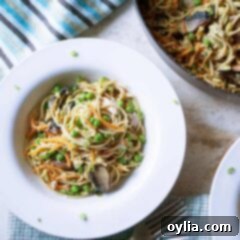 Simple Light Tuna Noodle Bake 5 An overhead of a white bowl filled with tuna casserole skillet.