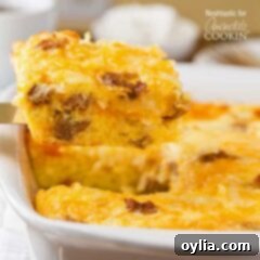 A close up of a square of turkey hash brown breakfast casserole on a spatula.