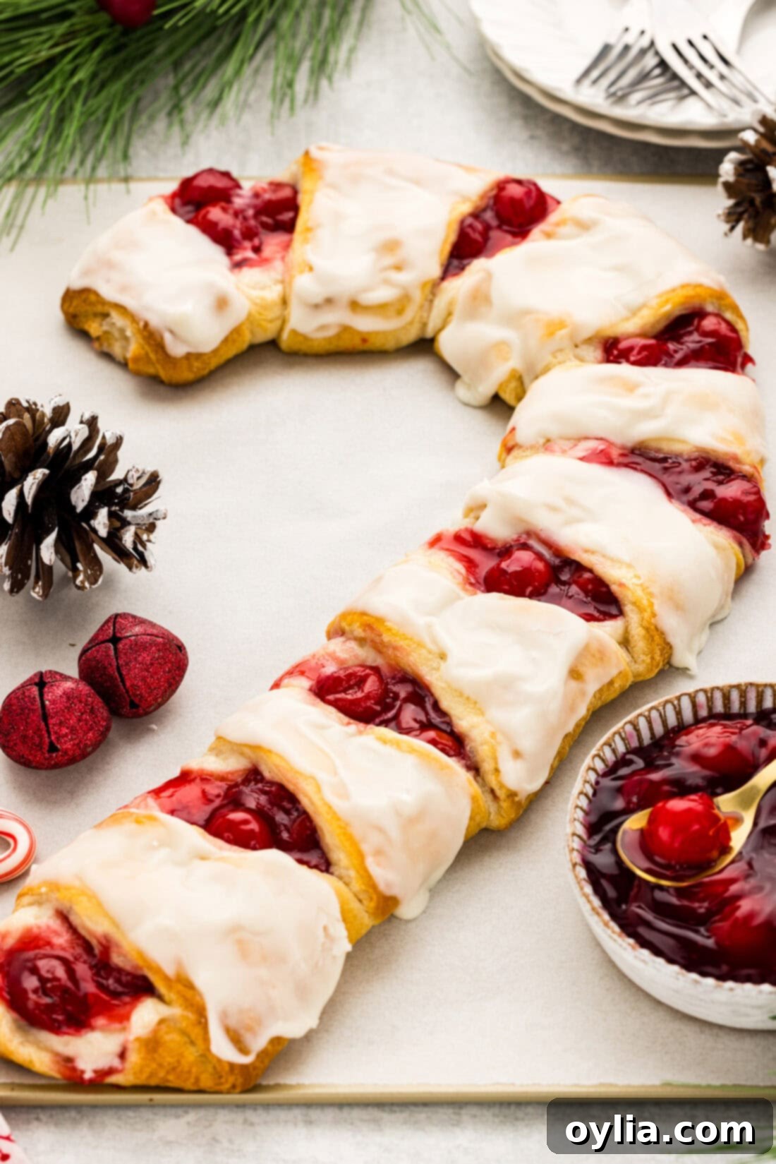 A complete Candy Cane Danish, glazed and ready to be served for a festive holiday brunch