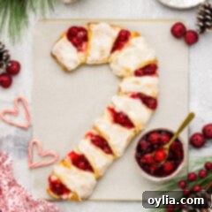 Close up photo of a Candy Cane Danish on parchment paper, ready to be served