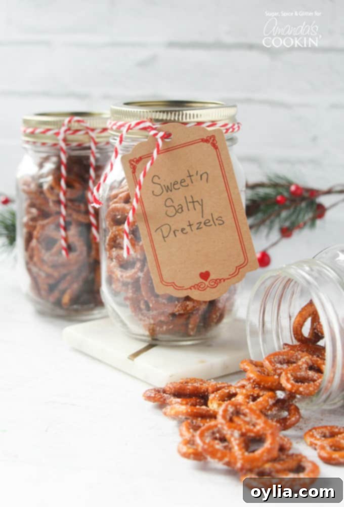 Mason jars filled with perfectly coated sweet and salty pretzels, ready for gifting.