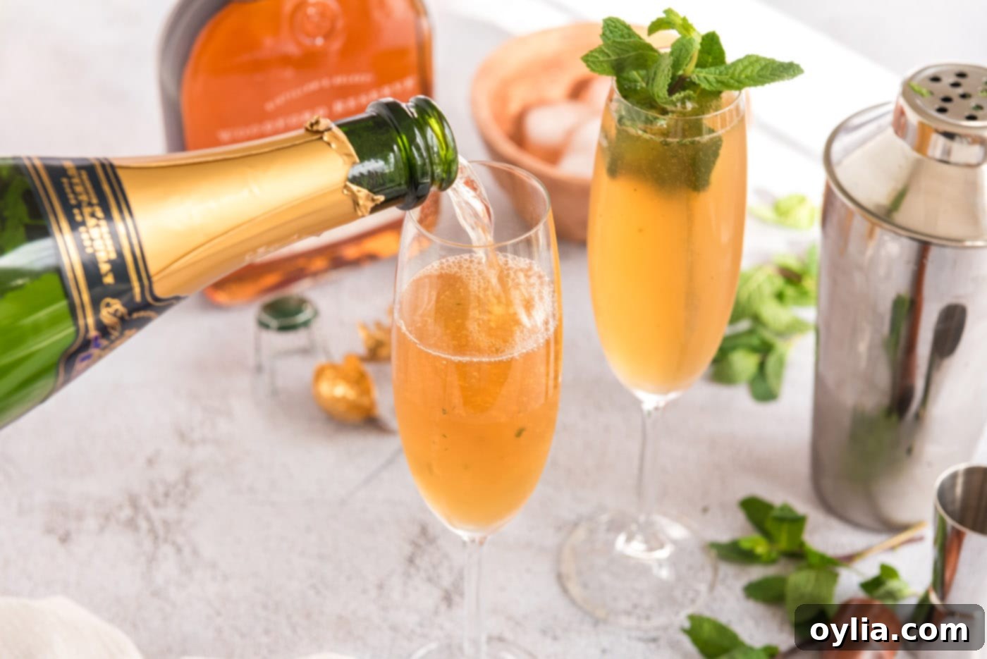 topping fizzy julep with champagne