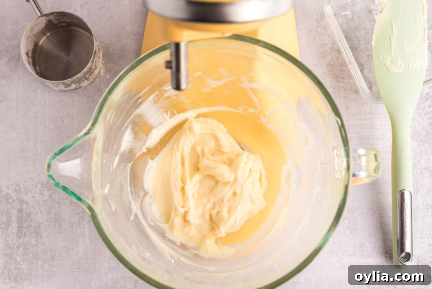 cream cheese, powdered sugar, and peppermint extract beaten in a bowl of a mixer