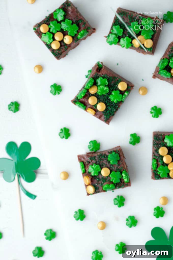 Squares of Baileys Irish Cream Chocolate Fudge on a white plate