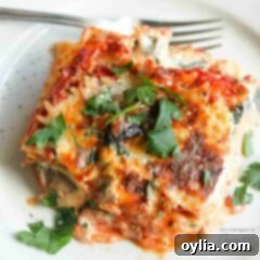 Garden Veggie Lasagna 8 overhead photo of veggie lasagna on a white plate