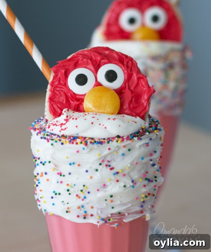 Close-up of a delightful Elmo Freakshake, a perfect treat for a birthday party or special occasion.