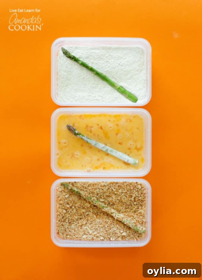 three trays showing the steps for making asparagus fries, illustrating the dredging process