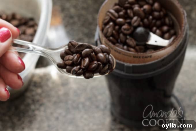 coffee beans into grinder
