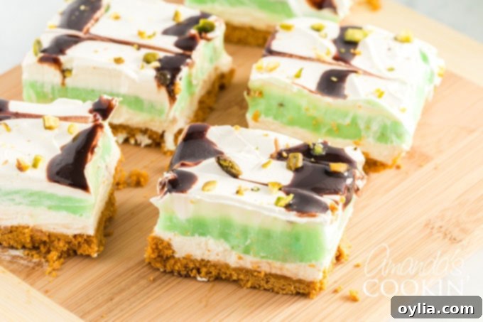 4 slices of pistachio lush on cutting board