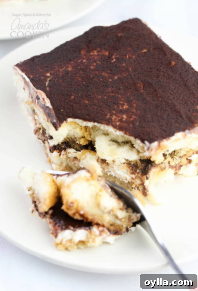 Fork full of tiramisu icebox cake