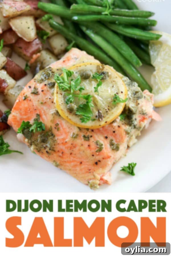 This Dijon Lemon Caper Salmon will have Salmon lovers rejoicing with Dijon, lemon and caper flavor infused into melt-in-your-mouth fillets of salmon. pinterest image with text